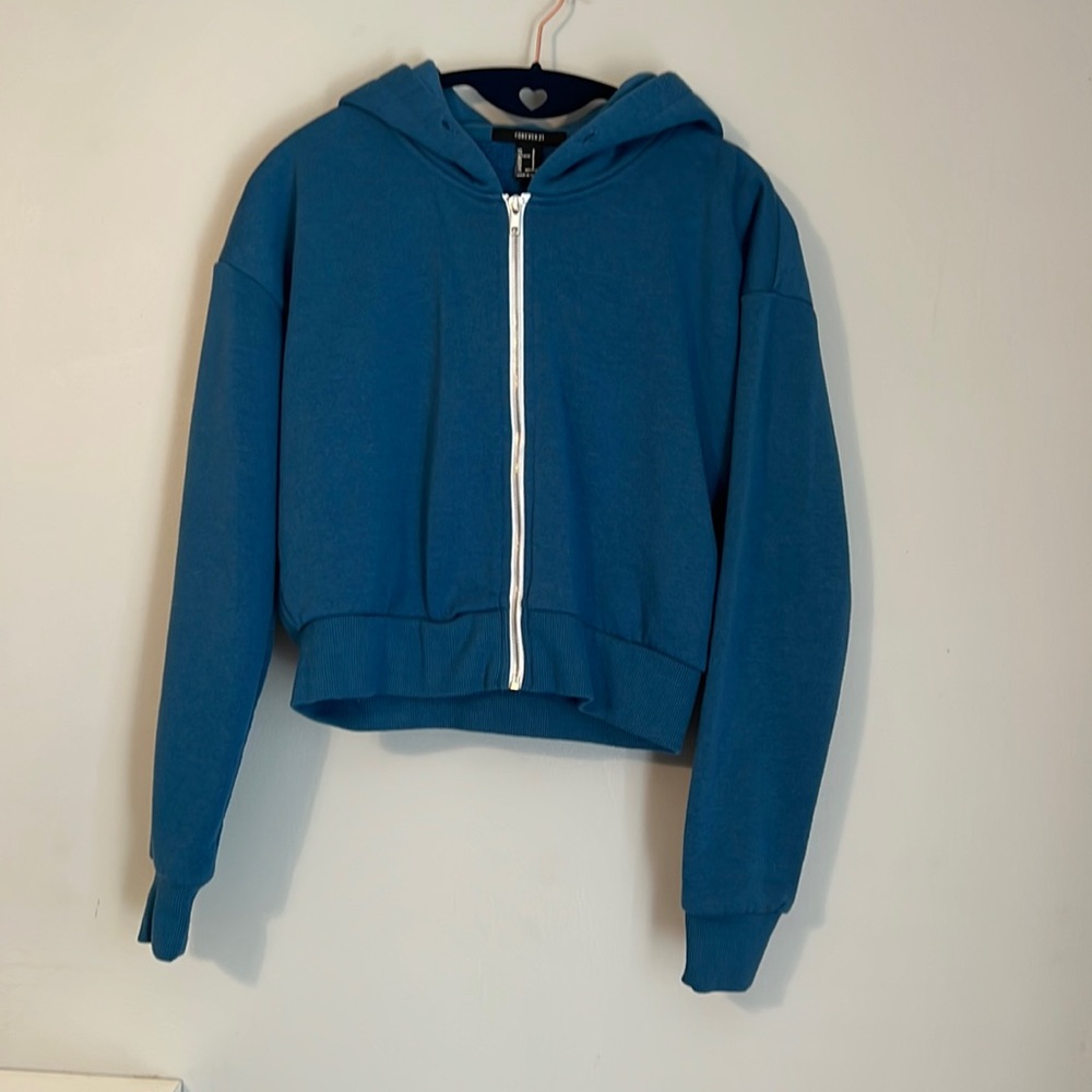 Clever 21 cropped blue bomber jacket.